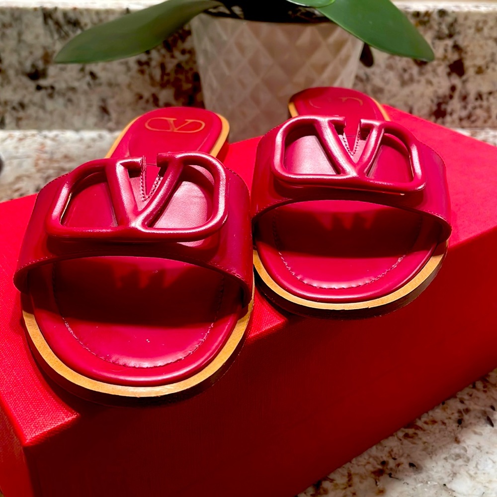 Beautiful Valentino slides.